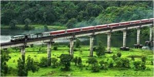 Konkan Railway train passing through the Western Ghats, symbolizing KRCL’s strategic coastal route